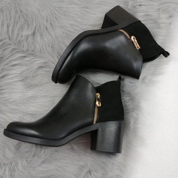 black ankle boots with gold zipper